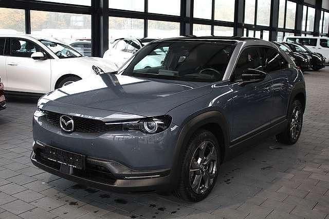 Grau metallic Gebraucht 2021 Mazda MX30 Comfort SUV | 15.850 € (Fairer Preis) - Bild 1/4