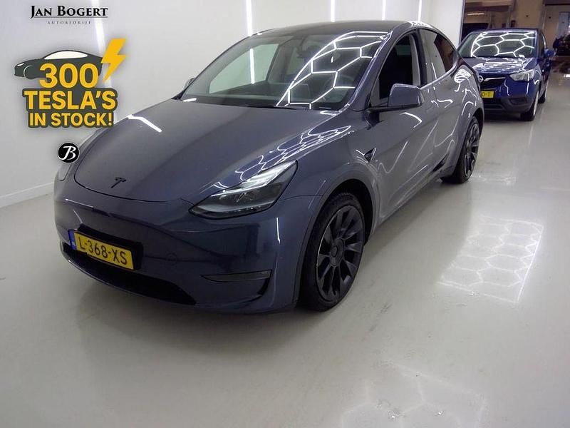 Grau Gebraucht 2021 Tesla Model Y Long Range AWD SUV | 33.900 € (Fairer Preis) - Bild 1/4