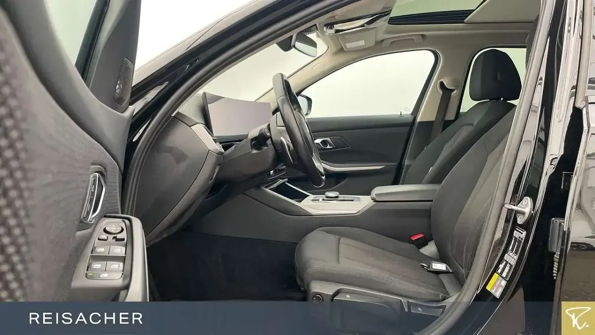 Gebraucht BMW 320e 204 PS (150 kW) 2022 Schwarz uni Kombi