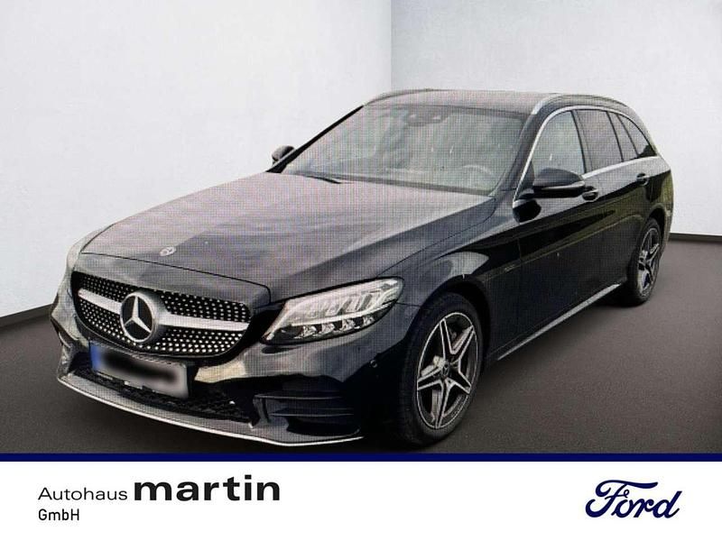 Obsidianschwarz Gebraucht 2021 Mercedes C300 AMG line Kombi | 27.990 € - Bild 1/2