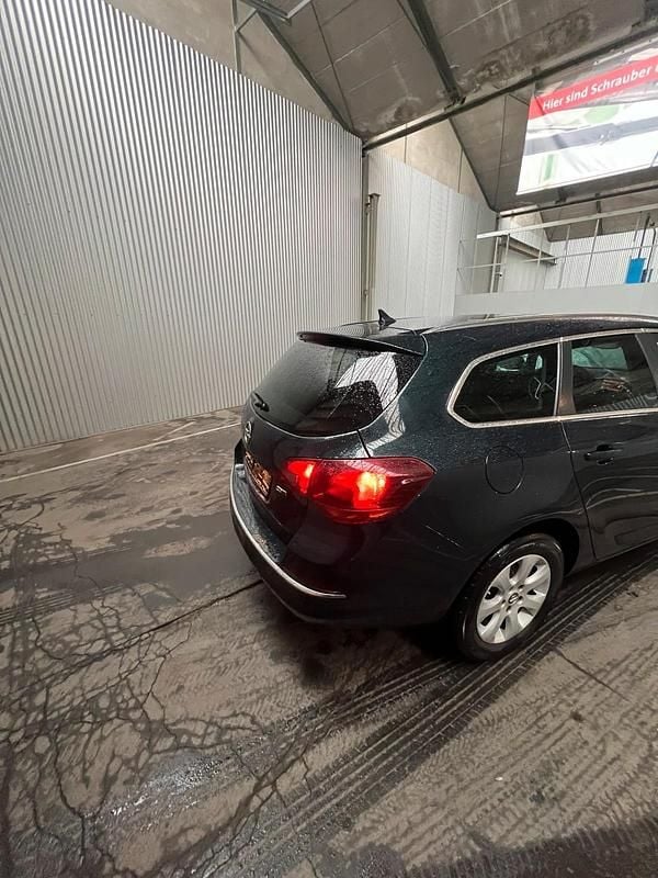 Gebraucht Opel Astra 110 PS (80 kW) 2016 Grün Kombi