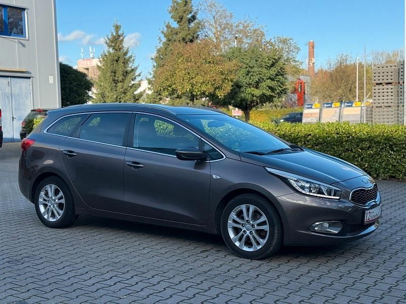 Braun Gebraucht 2014 Kia Ceed Sportswagon Kombi | 7.900 € (Fairer Preis) - Bild 1/2