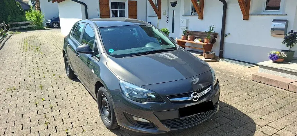 Używany Opel Astra 101 KM (74 kW) 2015 Szary Sedan/Limuzyna