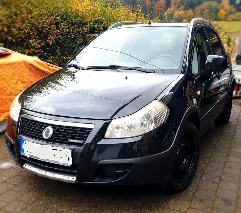 Schwarz Gebraucht 2007 Fiat Sedici Emotion SUV | 2.950 € (Fairer Preis) - Bild 1/4