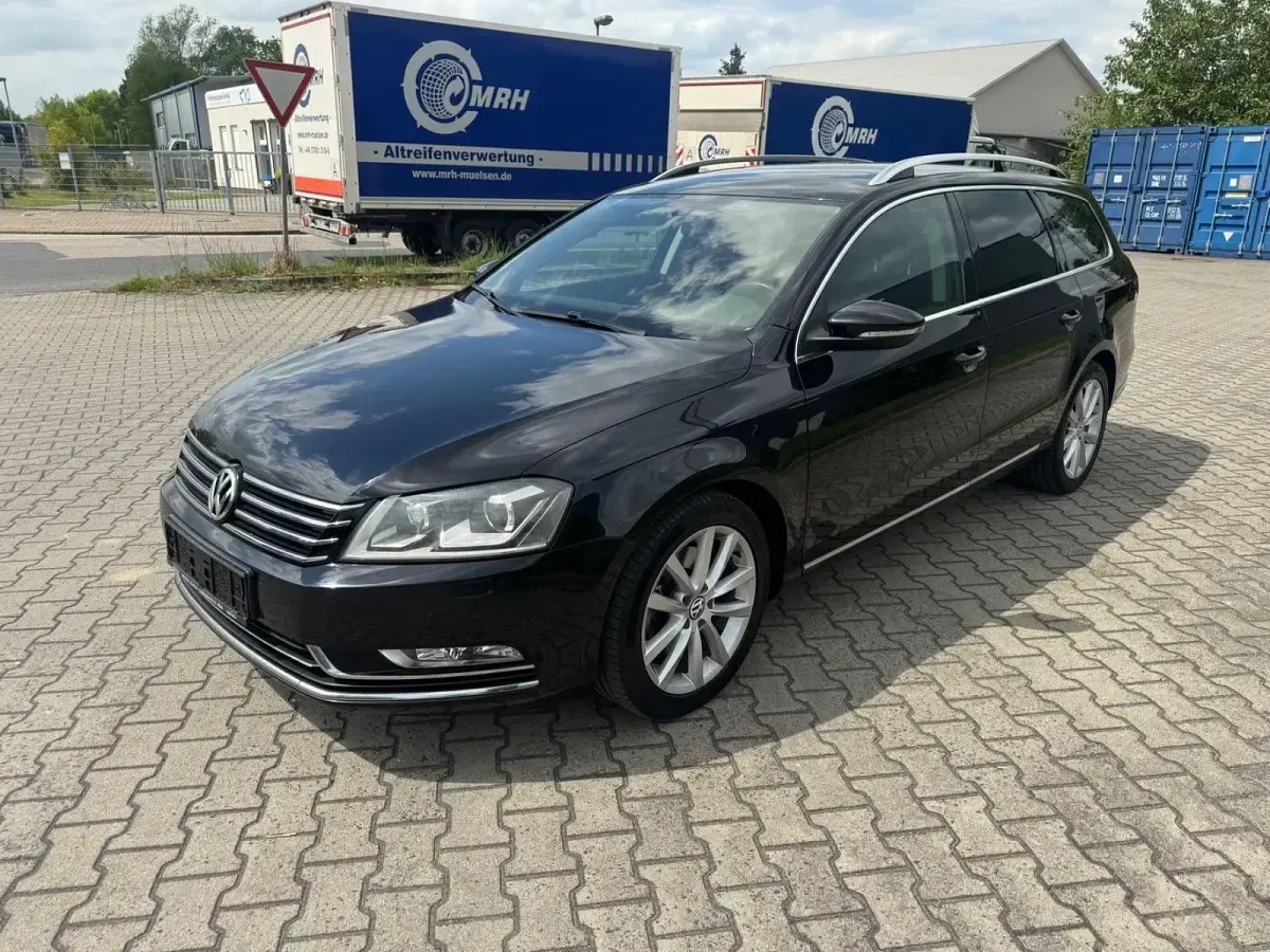 Second-hand VW Passat Highline 160 CP (117 kW) 2012 Negru Break