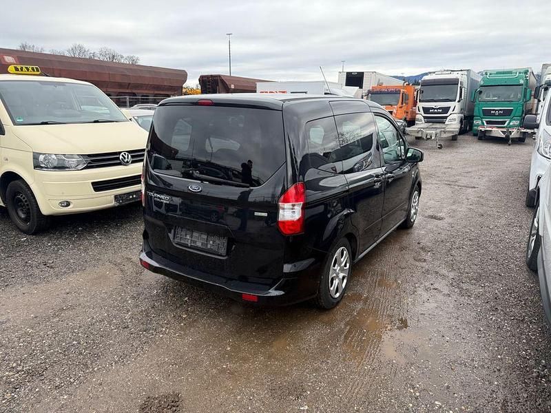 Gebraucht Ford Tourneo Courier Trend 101 PS (74 kW) 2014 Schwarz Van / Kleinbus