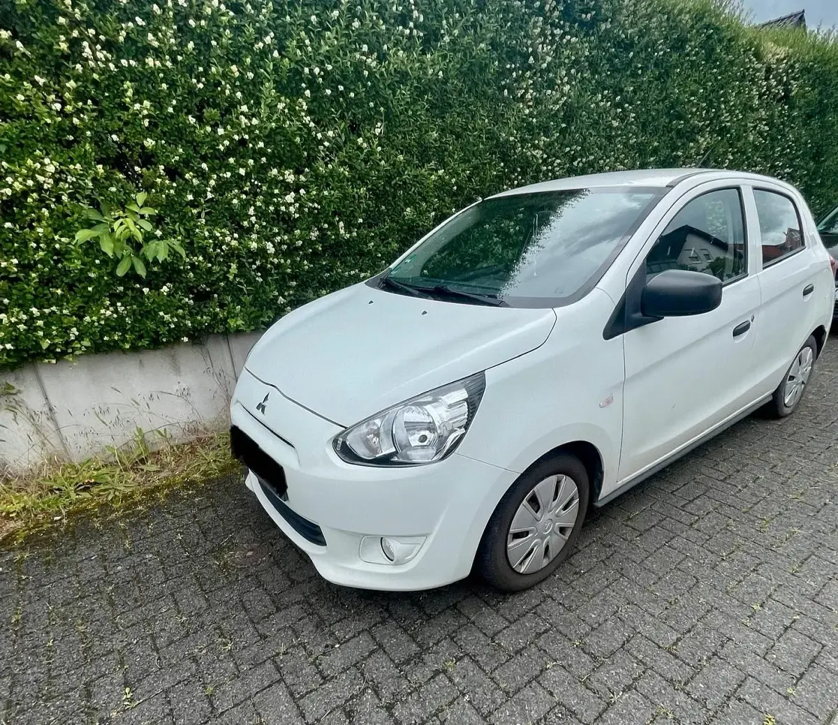 Gebraucht Mitsubishi Space Star 71 PS (52 kW) 2015 Weiß Kleinwagen