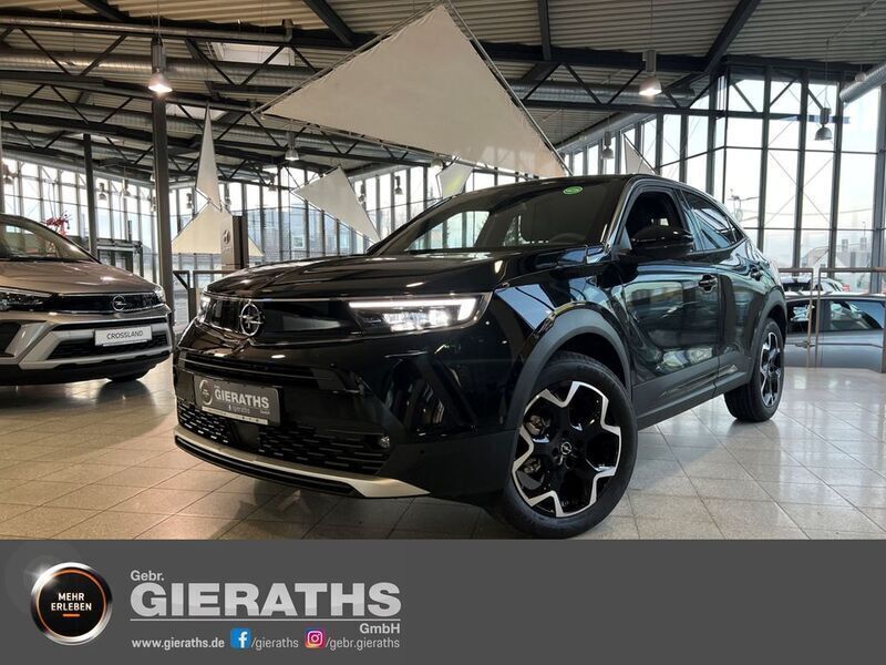 Lackierung schwarz perla nera/typ aussenverkleidung metalliclackierung Gebraucht 2023 Opel Mokka-e Ultimate SUV | 29.750 € - Bild 1/4
