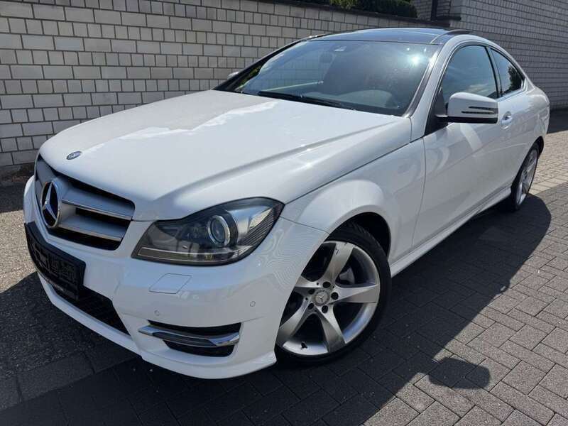 Polarweiss unilack Gebraucht 2014 Mercedes C220 AMG Coupé | 15.490 € - Bild 1/4
