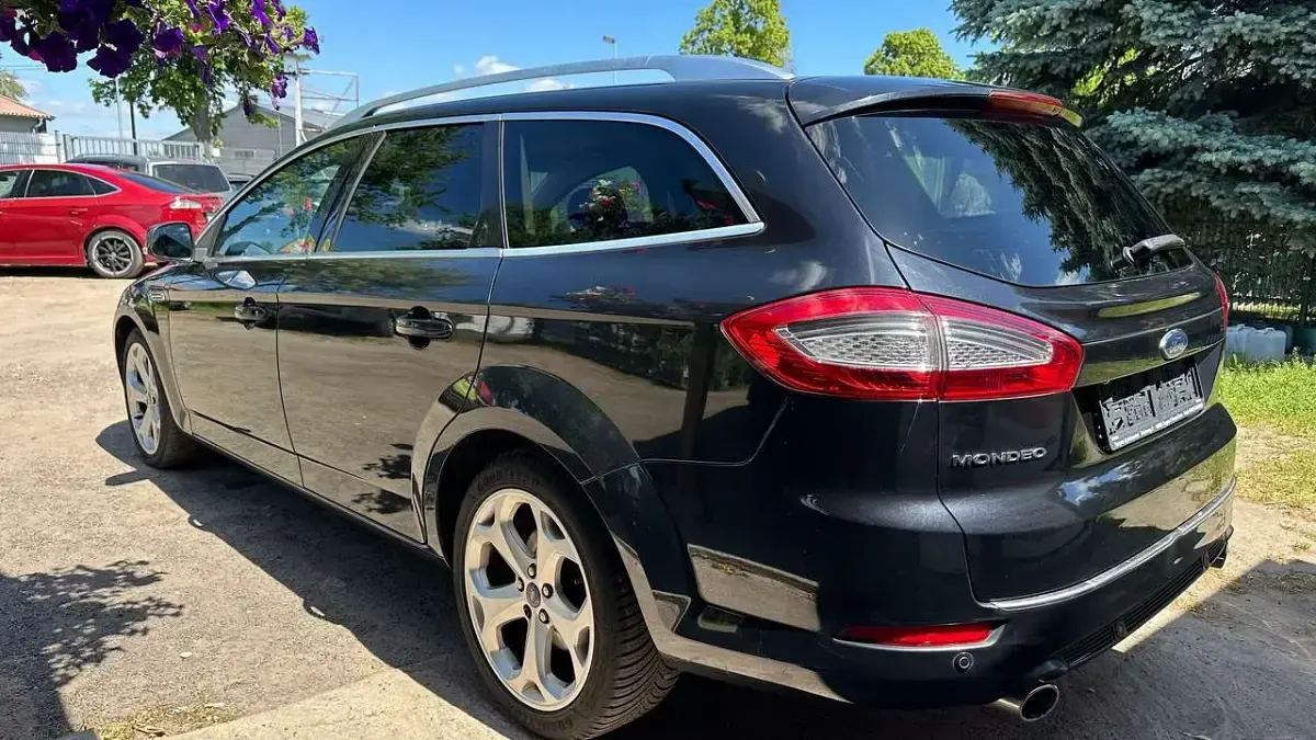 Gebraucht Ford Mondeo Titanium 200 PS (147 kW) 2011 Pantherschwarz metallic Kombi