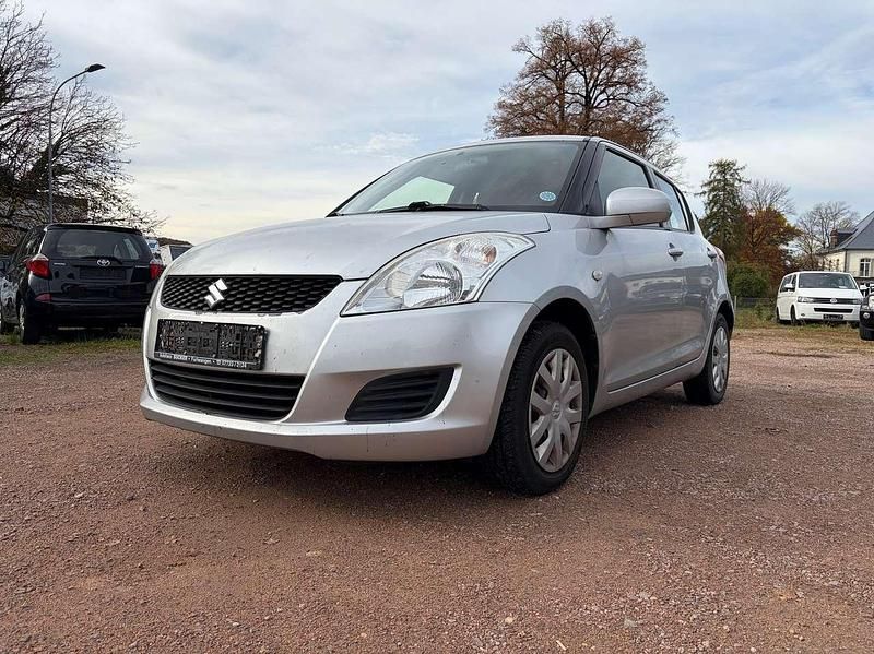 Silber Gebraucht 2011 Suzuki Swift Club Kleinwagen | 3.950 € (Fairer Preis) - Bild 1/4