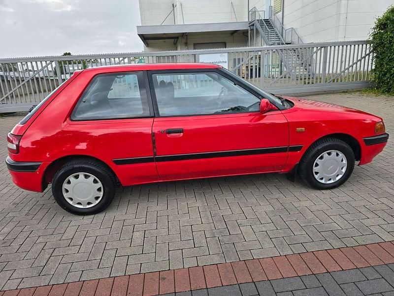 Gebraucht Mazda 323 88 PS (64 kW) 1993 Rot Limousine
