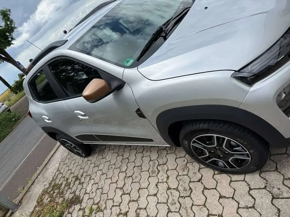 Gebraucht Dacia Spring Extreme 47 kW (65 PS) 2024 Grau Kleinwagen