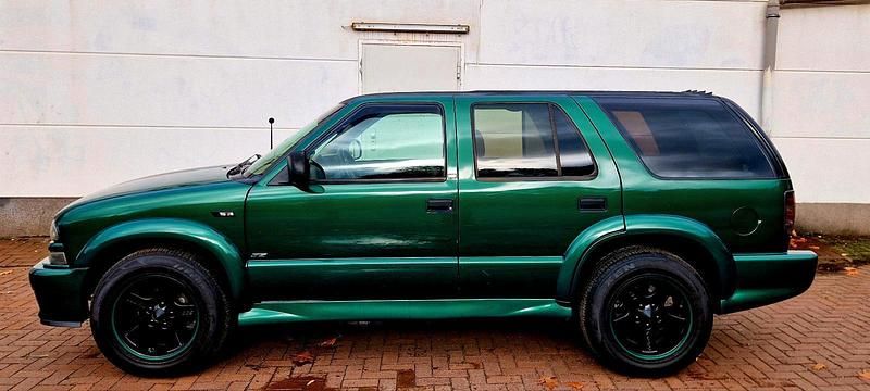 Grün Gebraucht 2000 Chevrolet Blazer SUV | 6.666 € (Fairer Preis) - Bild 1/4