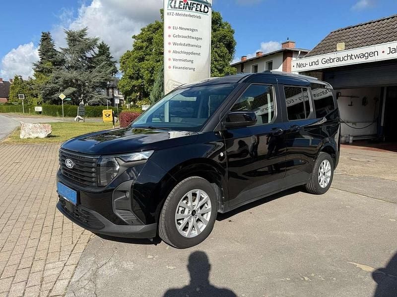 Agate black metallic Gebraucht 2024 Ford Tourneo Courier Titanium Van / Kleinbus | 22.890 € (Guter Preis) - Bild 1/4