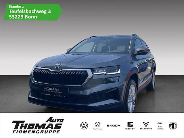 Graphitegrau metallic Gebraucht 2024 Skoda Karoq Selection SUV | 31.880 € (Fairer Preis) - Bild 1/3