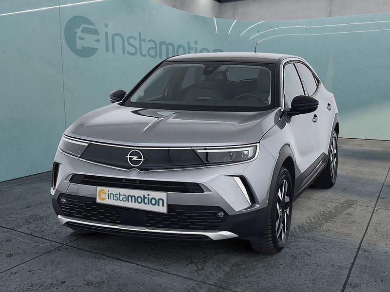 Grau Gebraucht 2022 Opel Mokka-e Elegance SUV | 19.199 € (Fairer Preis) - Bild 1/4
