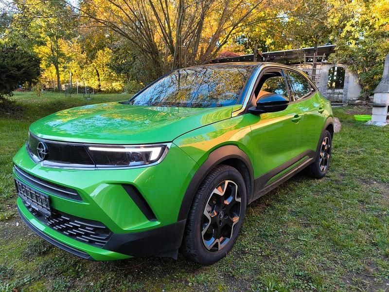 Grün Gebraucht 2021 Opel Mokka-e Elegance SUV | 14.400 € (Superpreis) - Bild 1/4
