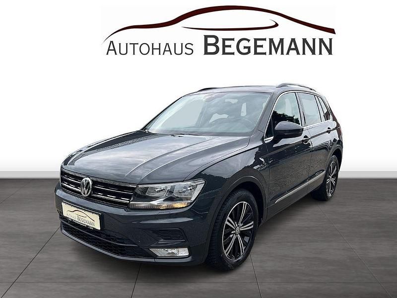 Uranograu/cinza urano Gebraucht 2017 VW Tiguan Comfortline SUV | 15.950 € (Fairer Preis) - Bild 1/4