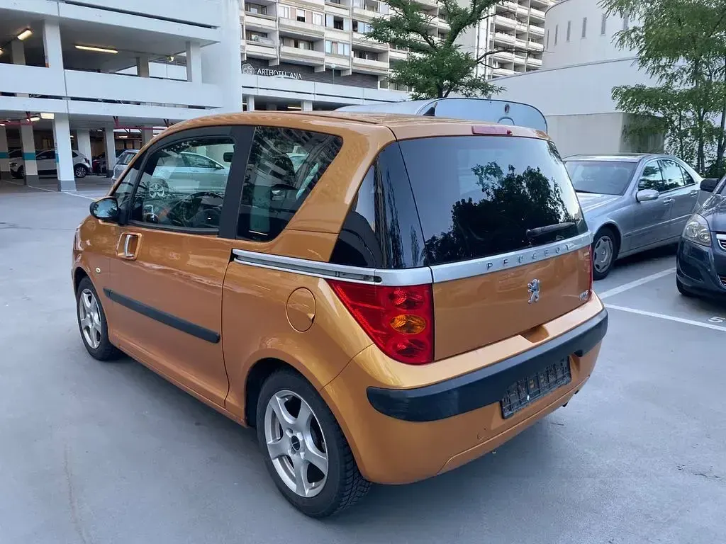 Gebraucht Peugeot 1007 109 PS (80 kW) 2006 Gold Van / Kleinbus