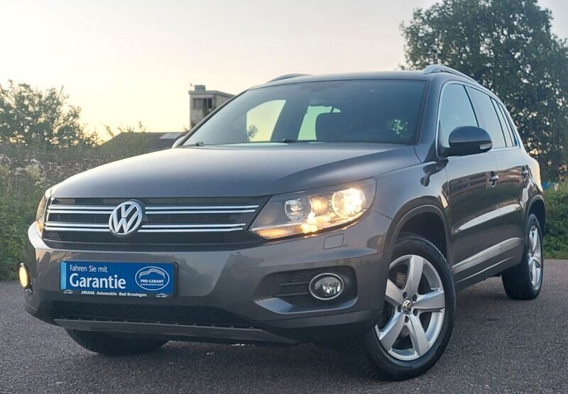 Grau Gebraucht 2016 VW Tiguan LOUNGE SUV | 14.990 € (Fairer Preis) - Bild 1/4