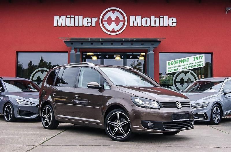 Toffeebraun Gebraucht 2014 VW Touran Cup Van / Kleinbus | 10.900 € (Teuer) - Bild 1/4