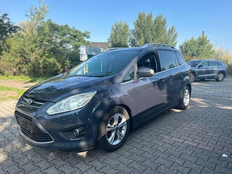 Grau Gebraucht 2012 Ford Grand C-Max Champions Edition Van / Kleinbus | 5.400 € (Fairer Preis) - Bild 1/4
