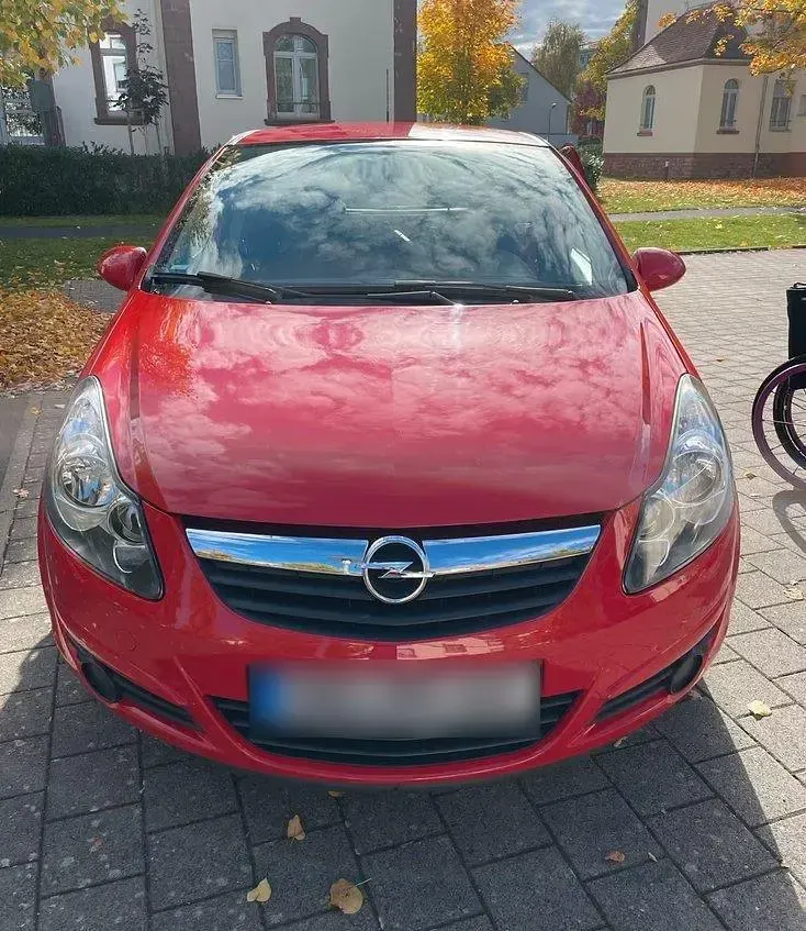 Gebraucht Opel Corsa 86 PS (63 kW) 2011 Rot Kleinwagen