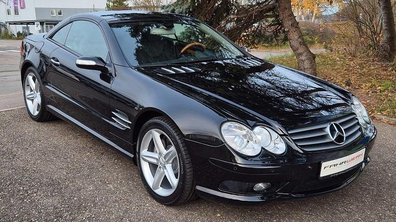 Obsidianschwarz metallic Gebraucht 2007 Mercedes SL500 AMG Cabrio | 43.530 € - Bild 1/4