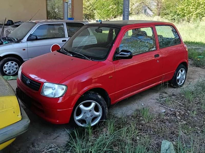 Rot Gebraucht 2002 Daihatsu Cuore Kleinwagen | 4.500 € - Bild 1/2