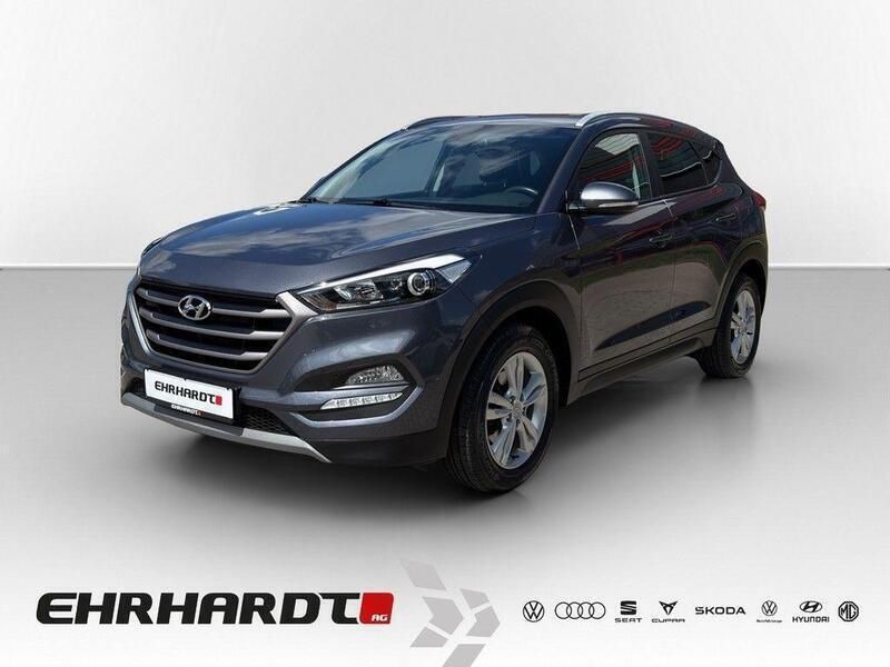 Grau Gebraucht 2018 Hyundai Tucson Style SUV | 19.990 € (Fairer Preis) - Bild 1/4