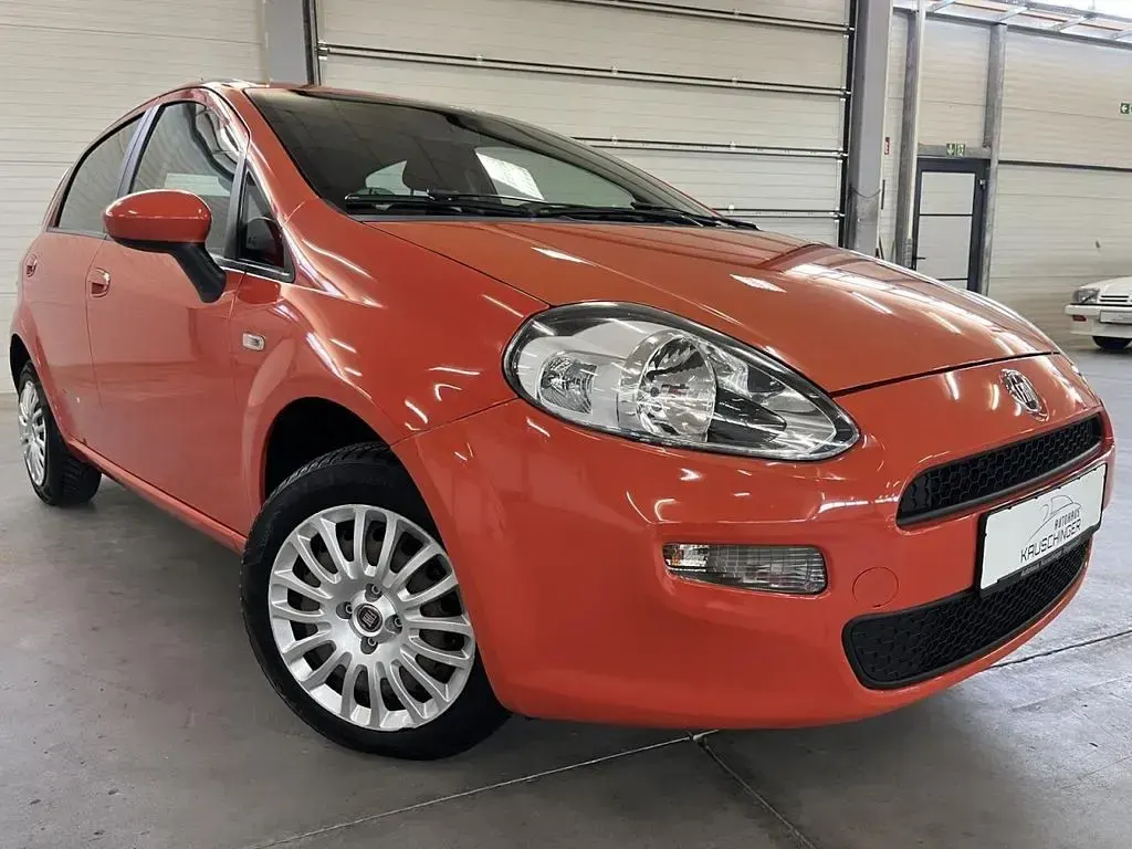Gebraucht Fiat Punto 77 PS (56 kW) 2013 Colore esterno arancio spritz Kleinwagen