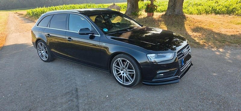 Używany Audi A4 Ambition 170 KM (125 kW) 2012 Czarny Kombi