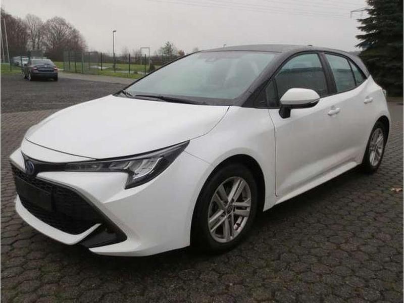 Super white 2 / dach schwarz Gebraucht 2023 Toyota Corolla Hybrid Comfort Limousine | 20.990 € - Bild 1/3