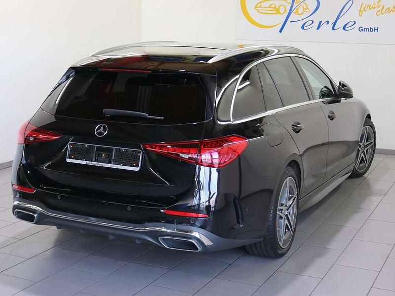 Gebraucht Mercedes C200 AMG line 163 PS (119 kW) 2023 Obsidianschwarz met. Kombi