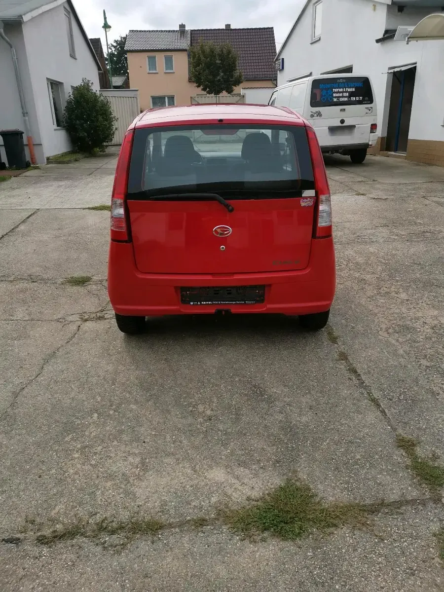 Gebraucht Daihatsu Cuore 58 PS (42 kW) 2004 Rot Kleinwagen