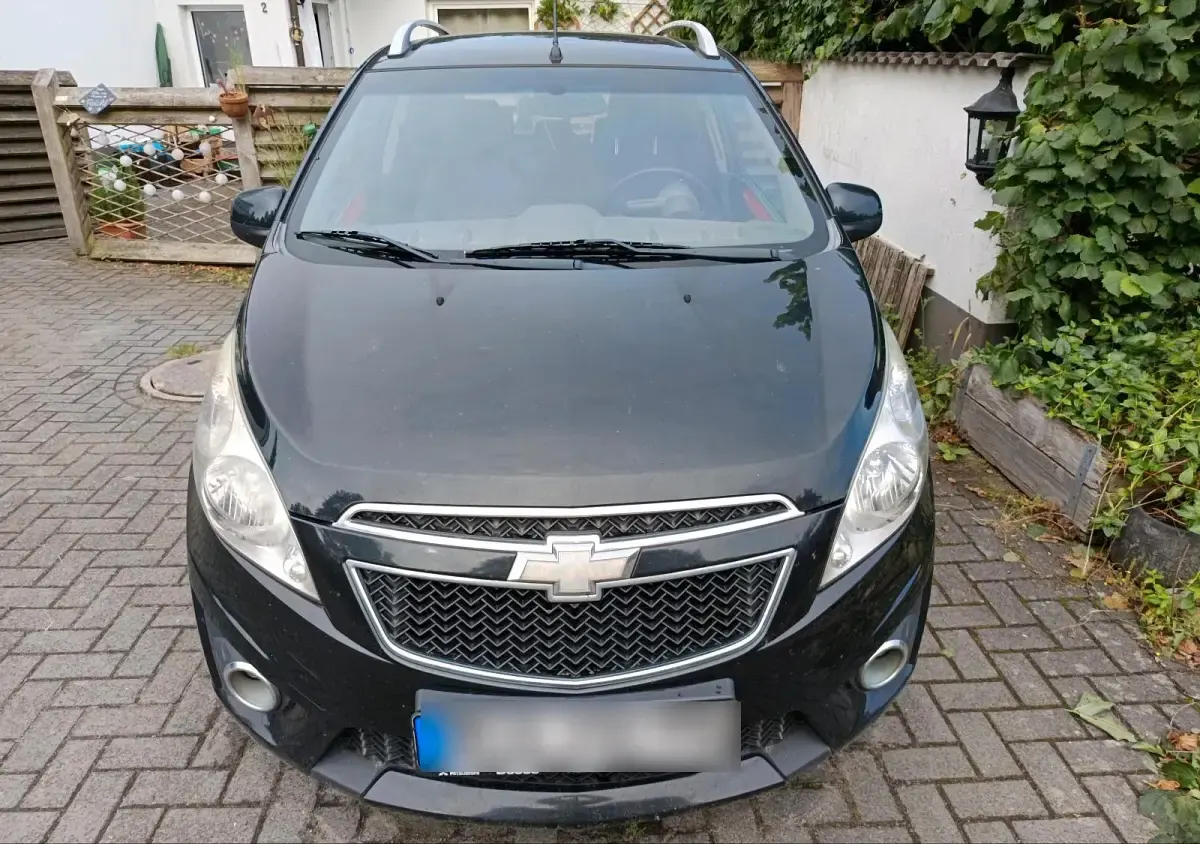 Gebraucht Chevrolet Spark 82 PS (60 kW) 2012 Schwarz Kleinwagen