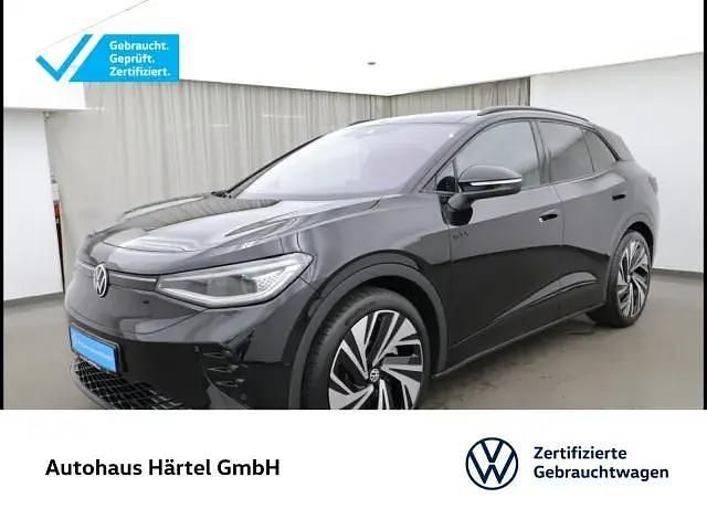 Grenadillschwarz (black), metallic Gebraucht 2024 VW ID.4 GTX SUV | 44.300 € (Teuer) - Bild 1/4