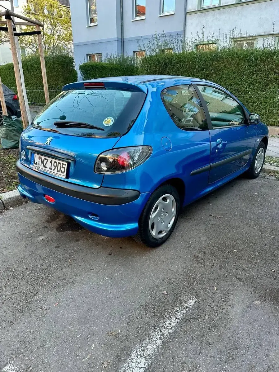 Używany Peugeot 206 75 KM (55 kW) 2002 Niebieski Coupe