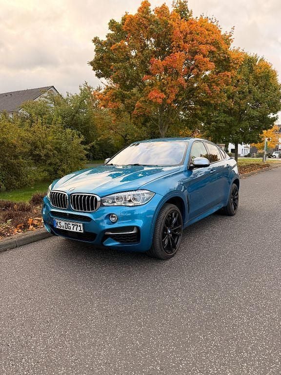 Blau Gebraucht 2017 BMW X6 M50 Performance SUV | 45.490 € (Teuer) - Bild 1/4