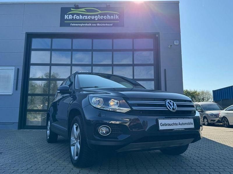 Grau Gebraucht 2015 VW Tiguan LOUNGE SUV | 16.499 € (Etwas zu teuer) - Bild 1/4