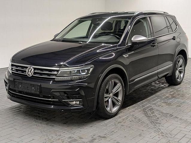 Schwarz (tiefschwarzmet.) Gebraucht 2020 VW Tiguan Allspace Highline SUV | 29.400 € (Fairer Preis) - Bild 1/4