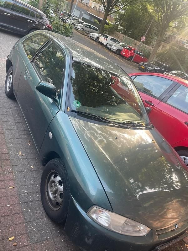 Grün Gebraucht 2002 Mitsubishi Colt Kleinwagen | 1.500 € - Bild 1/4