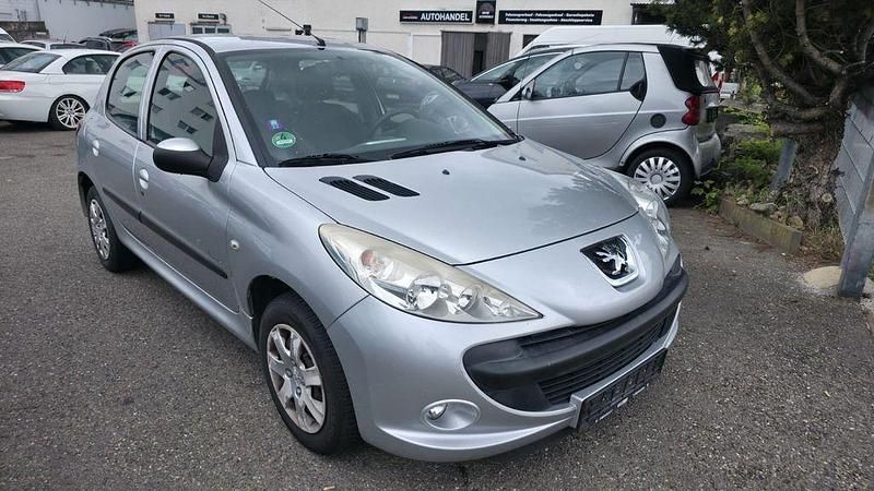 Grau Gebraucht 2011 Peugeot 206+ Urban Move Kleinwagen | 1.990 € (Fairer Preis) - Bild 1/4