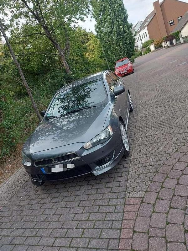Grau Gebraucht 2010 Mitsubishi Lancer Intense Limousine | 6.999 € (Teuer) - Bild 1/4