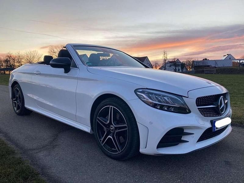 Weiß Gebraucht 2020 Mercedes C180 AMG line Cabrio | 34.199 € (Etwas zu teuer) - Bild 1/4