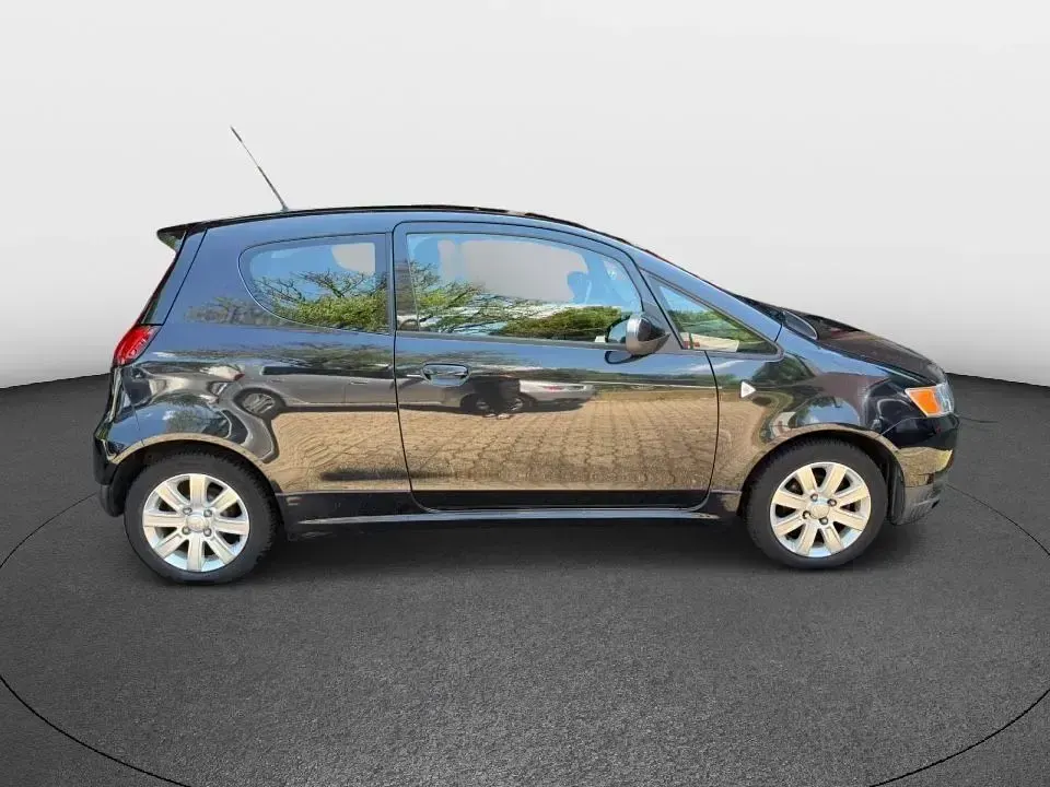 Gebraucht Mitsubishi Colt 75 PS (55 kW) 2013 Schwarz Kleinwagen