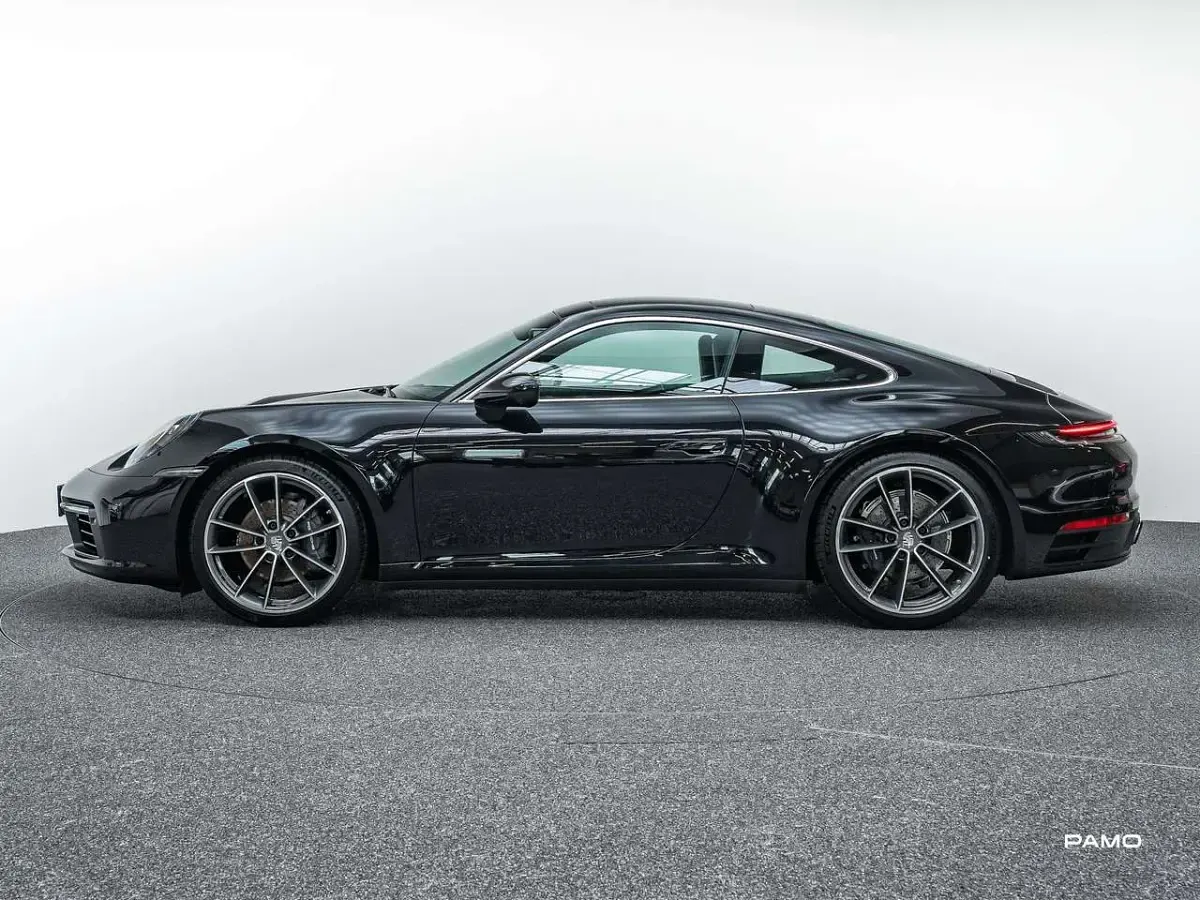 Gebraucht Porsche 992 385 PS (283 kW) 2023 Tiefschwarzmetallic Coupé