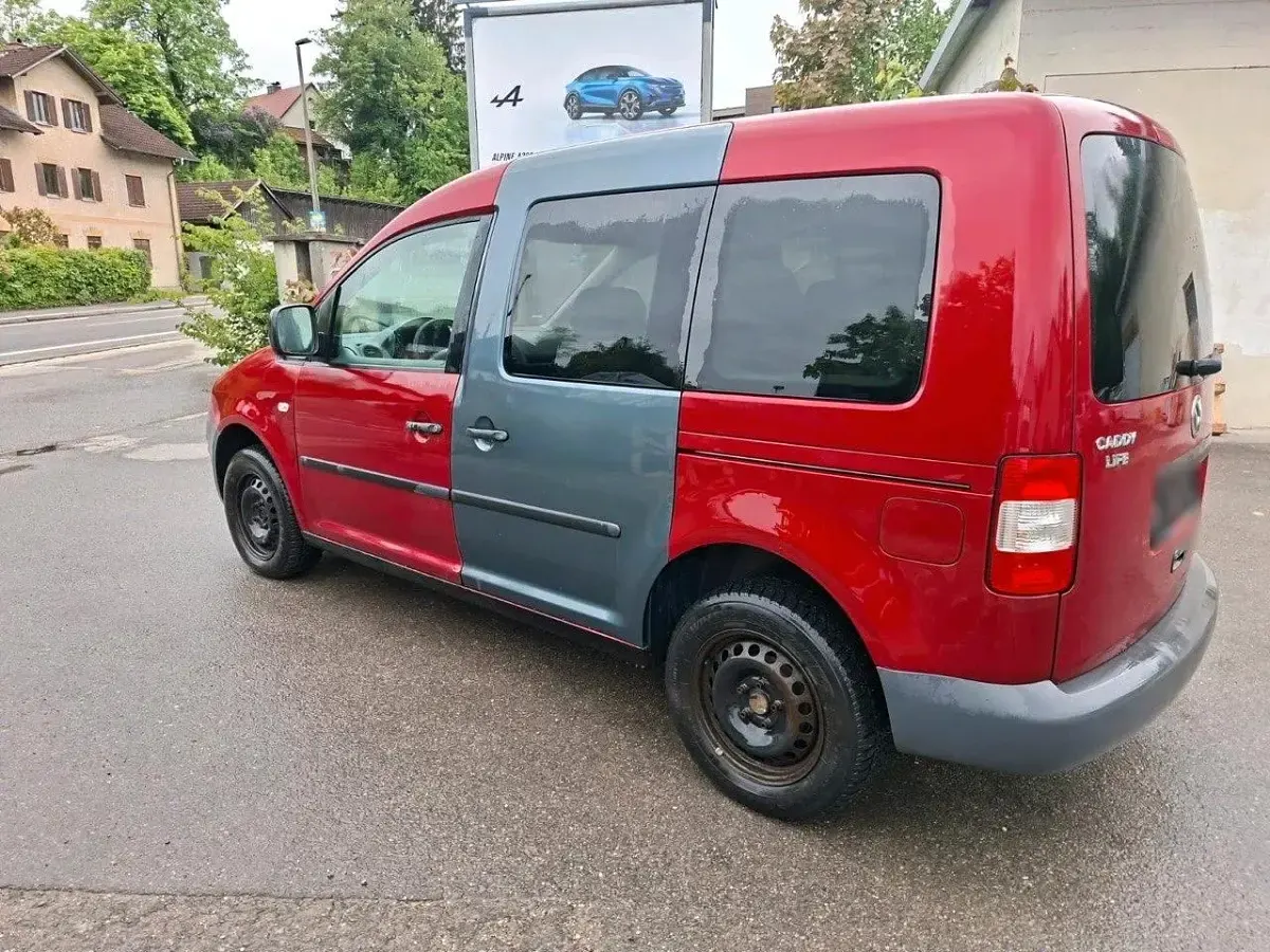 Używany VW Caddy 105 KM (77 kW) 2006 Czerwony Minivan