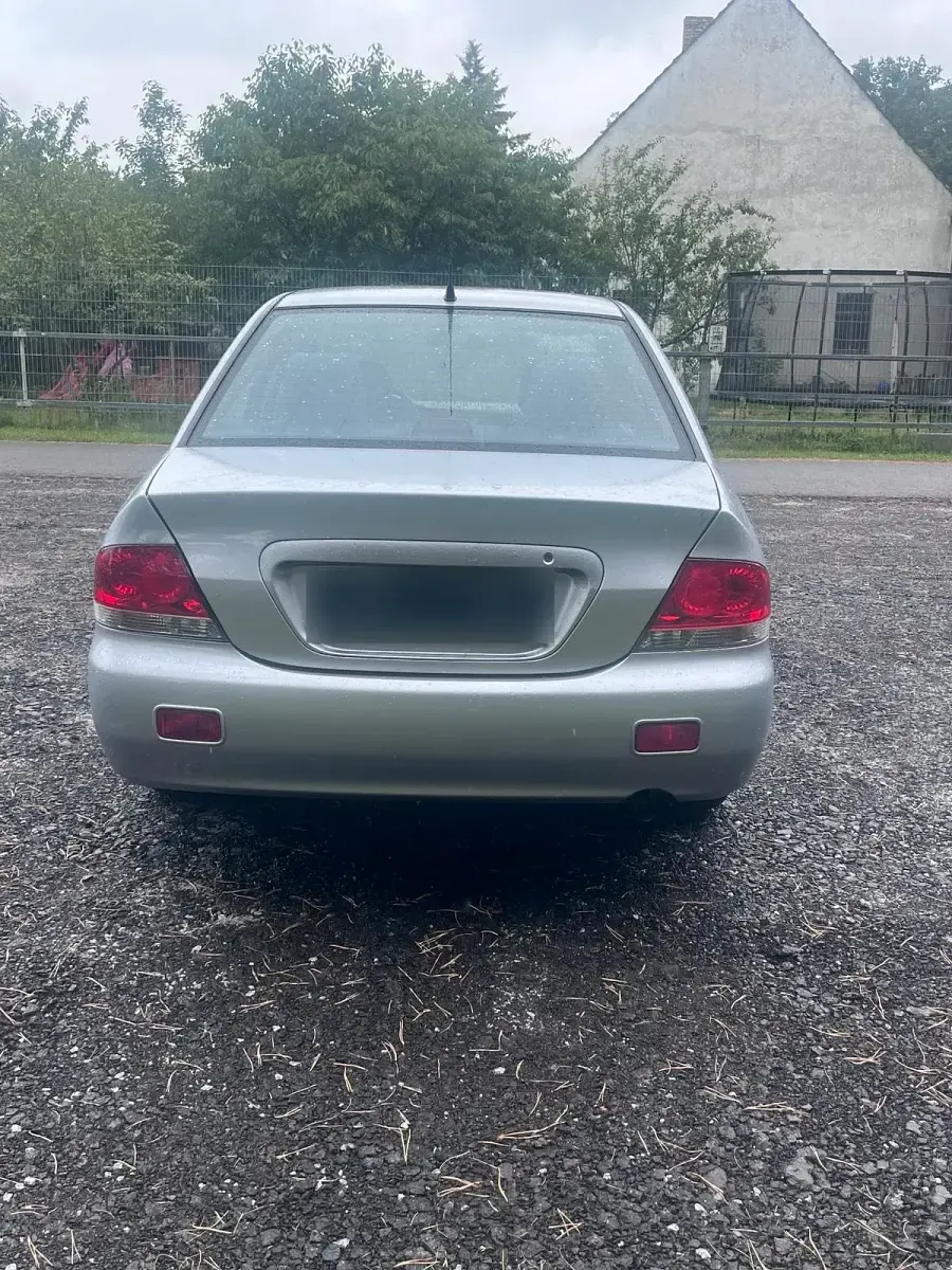 Gebraucht Mitsubishi Lancer 98 PS (72 kW) 2003 Silber Limousine